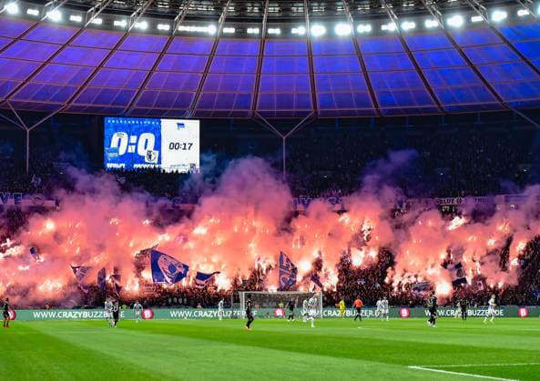 Soccer 2 Bundesliga, Hertha BSC 1 FC Magdeburg 16 02 2024, xdanx, Soccer 2 Bundesliga, Hertha BSC 1 FC Magdeburg, v l fans, atmosphere, scarves, flags, visitors, jerseys, Ultras, Hertha BSC Berlin to send pyrotechnics, Bengalos, smoke DFL DFB REGULATIONS PROHIBIT ANY USE OF PHOTOGRAPHS as IMAGE SEQUENCES and or QUASI VIDEO Photo Daniel Lakomski Mix1 Berlin Olympiastadion Berlin Berlin Germany EN Copyright: xDanielxLakomskix
