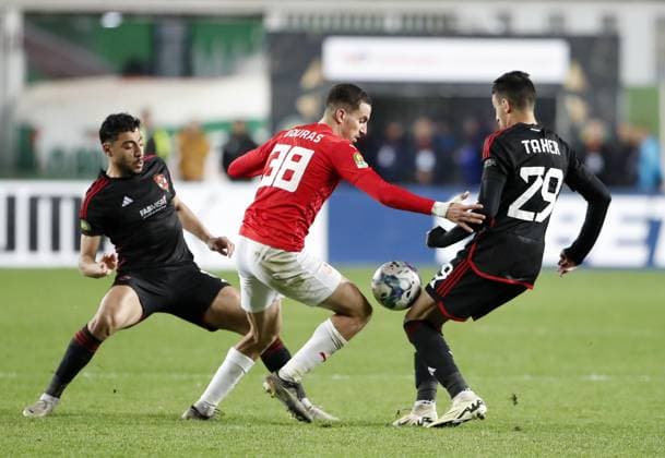 (240217) -- ALGIERS, Feb. 17, 2024 -- CR Belouizdad s Akram Bouras (C) competes the CAF Champions League 2023 2024 football match between CR Belouizdad of Algeria and Al Ahly of Egypt at 5th July Stadium in Algiers, Algeria, Feb. 16, 2024. (SP)ALGERIA-ALGIERS-FOOTBALL-CAF CHAMPIONS LEAGUE-CR BELOUIZDAD VS AL AHLY(5) (Xinhua) 
