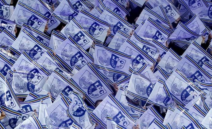 Magdeburg fans with flags sea of flags choreography sports football soccer DFL 2 Bundesliga men 22 matchday season 2023 2024 16 02 2024 Hertha BSC Berlin vs 1 FC Magdeburg FCM DFL regulations prohibit any use of photographs as image sequences and or quasi video