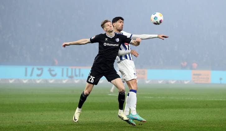 Luca Schuler, Andreas Bouchalakis duel Match scene Action Sport Football Soccer DFL 2 Bundesliga Men 22 Matchday Season 2023 2024 16 02 2024 Hertha BSC Berlin vs 1 FC Magdeburg FCM DFL regulations prohibit any use of photographs as image sequences and or quasi video