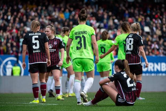 Marina Hegering VfL Wolfsburg, 31 is happy about the goal for 1 9, Nele Bauereisen FC Nuernberg, 23 , Alina Mailbeck FC Nuernberg, 05 is annoyed, GER, FC Nuernberg vs VfL Wolfsburg, Football Google Pixel Womens Bundesliga, 14 Matchday, Saison 2023 2024, 17 02 2024 DFB regulations prohibit any use of photographs as image sequences and or quasi video GER, FC Nuernberg vs VfL Wolfsburg, Fußball Google Pixel Frauen Bundesliga, 14 Spieltag, Saison 2023 2024, 17 02 2024 Nuernberg Copyright: xEibner-Pressefoto Memmlerx EP_MMR