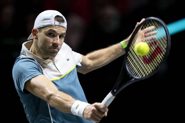 ROTTERDAM - Grigor Dimitrov (Bulgaria) in action against Alex de Minaur (Australia) during the first semi-final on the sixth day of the ABN AMRO Open tennis tournament in Ahoy. ANP SANDER KONING ABN AMRO Open 2024 xVIxANPxSportx xxANPxIVx 491328156 originalFilename: 491328156.jpg