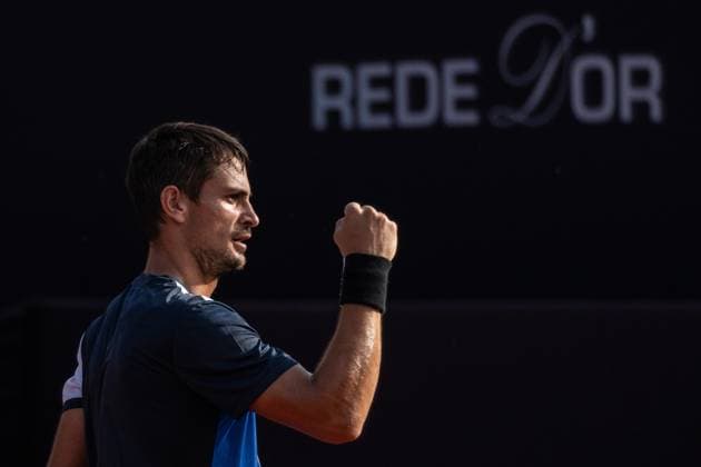 (240218) -- RIO DE JANEIRO, Feb. 18, 2024 -- Mariano Navone of Argentina celebrates scoring while competing against Mateus Alves of Brazil during the 1st round qualifying at the 2024 ATP500 Rio Open at Jockey Club Brasileiro in Rio de Janeiro, Brazil, Feb. 17, 2024. ) (SP)BRAZIL-RIO DE JANEIRO-TENNIS-ATP500-RIO OPEN WangxTiancong 