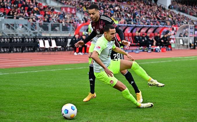 18 02 2024 Soccer Season 2023 2024 2 Soccer Bundesliga 22 Matchday 1 FC Nürnberg FCN Club 1 FC Kaiserslautern FCK Roten Teufel Sportfoto Zink xwoxzix DFL regulations prohibit any use of photographs as image sequences and or quasi video only for editorial use Kenny Prince Redondo 11, 1 FC Kaiserslautern FCK vor Jan Gyamerah 28, 1 FC Nürnberg FCN
