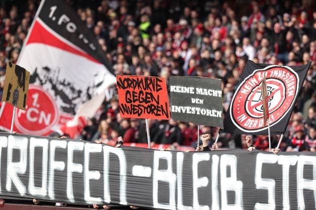 18 02 2024 Soccer Season 2023 2024 2 Soccer Bundesliga 22 Matchday 1 FC Nürnberg FCN Club 1 FC Kaiserslautern FCK Roten Teufel Sportfoto Zink DaMa xdaxmax DFL regulations prohibit any use of photographs as image sequences and or quasi video only for editorial use Clubfan Clubfans FCN Fans Fans protest inside the stadium during the match with banners banners signs and flags against the DFL and the planned investor entry