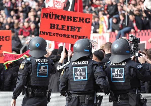 18 02 2024 Soccer Season 2023 2024 2 Soccer Bundesliga 22 Matchday 1 FC Nürnberg FCN Club 1 FC Kaiserslautern FCK Roten Teufel Sportfoto Zink DaMa xdaxmax DFL regulations prohibit any use of photographs as image sequences and or quasi video only for editorial use Clubfan Clubfans FCN Fans Fans protest in the interior during the game with banners banners signs and flags against the DFL and the planned investor entry observed by the police