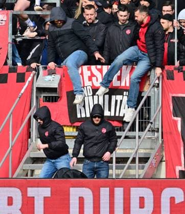 18 02 2024 Soccer Season 2023 2024 2 Soccer Bundesliga 22 Matchday 1 FC Nürnberg FCN Club 1 FC Kaiserslautern FCK Roten Teufel Sportfoto Zink xwoxzix DFL regulations prohibit any use of photographs as image sequences and or quasi video only for editorial use Clubfans climb over fence Protest Fan protest against investors