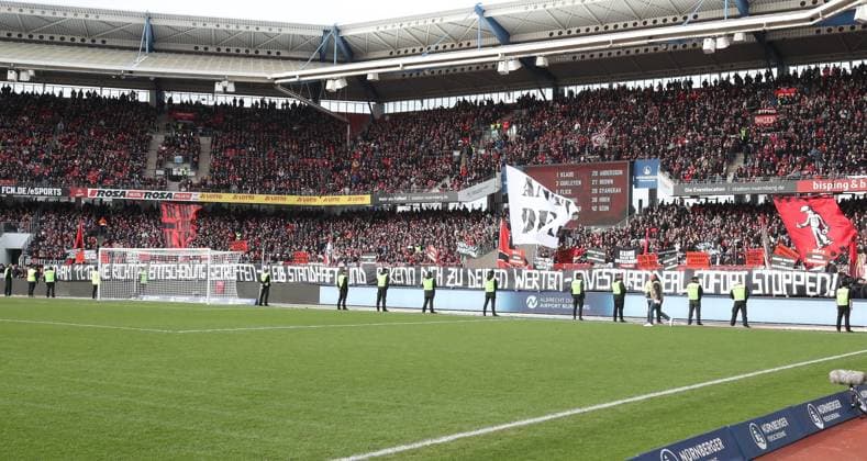 18 02 2024 Soccer Season 2023 2024 2 Soccer Bundesliga 22 Matchday 1 FC Nürnberg FCN Club 1 FC Kaiserslautern FCK Roten Teufel Sportfoto Zink DaMa xdaxmax DFL regulations prohibit any use of photographs as image sequences and or quasi video only for editorial use Clubfan Clubfans FCN Fans Fans protest inside the stadium during the match with banners banners signs and flags against the DFL and the planned investor entry