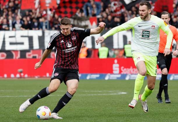 Picture from left Florian Flick 1 FC Nuernberg, 6 and Boris Tomiak 1 FC Kaiserslautern, 2 18 02 2024, Soccer, 2 Bundesliga, 1 FC Nuernberg 1 FC Kaiserslautern, GER, Nuernberg, Max Morlock Stadion DFL REGULATIONS PROHIBIT ANY USE OF PHOTOGRAPHS AS IMAGE SEQUENCES AND OR QUASI VIDEO Copyright: HMBxMedia xHeikoxBecker