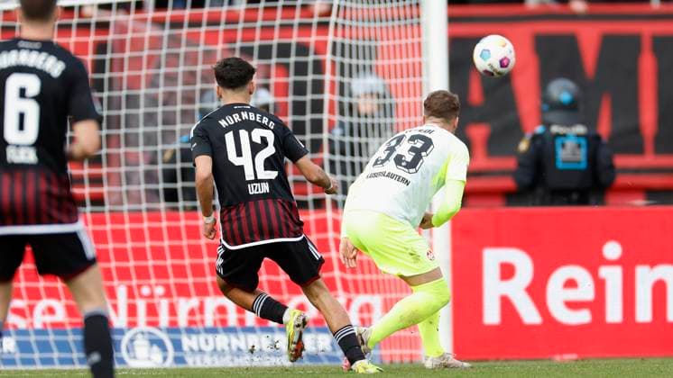 Picture from left Can Uzun 1 FC Nuernberg, 42 , Goal scored, scored the goal to 1 1 celebrate the goal, Jan Elvedi 1 FC Kaiserslautern, 33 18 02 2024, Football, 2 Bundesliga, 1 FC Nuernberg 1 FC Kaiserslautern, GER, Nuernberg, Max Morlock Stadion DFL REGULATIONS PROHIBIT ANY USE OF PHOTOGRAPHS AS IMAGE SEQUENCES AND OR QUASI VIDEO Copyright: HMBxMedia xHeikoxBecker