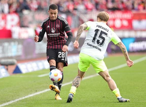 18 02 2024 Soccer Season 2023 2024 2 Soccer Bundesliga 22 Matchday 1 FC Nürnberg FCN Club 1 FC Kaiserslautern FCK Roten Teufel Sportfoto Zink DaMa xdaxmax DFL regulations prohibit any use of photographs as image sequences and or quasi video only for editorial use Jan Gyamerah 28, 1 FC Nürnberg FCN Tymoteusz Puchacz 15, 1 FC Kaiserslautern FCK