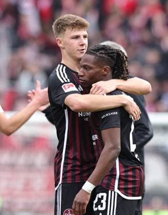 18 02 2024 Soccer Season 2023 2024 2 Soccer Bundesliga 22 Matchday 1 FC Nürnberg FCN Club 1 FC Kaiserslautern FCK Roten Teufel Sportfoto Zink DaMa xdaxmax DFL regulations prohibit any use of photographs as image sequences and or quasi video only for editorial use Julian Kania 46, 1 FC Nürnberg FCN Joseph Hungbo 23, 1 FC Nürnberg FCN hugging each other after the end of the match