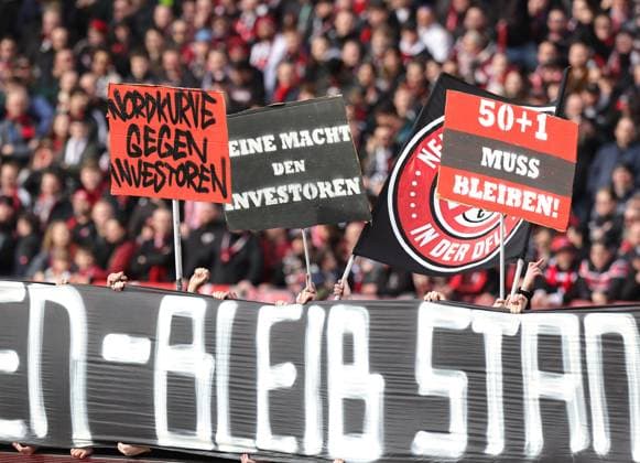 18 02 2024 Soccer Season 2023 2024 2 Soccer Bundesliga 22 Matchday 1 FC Nürnberg FCN Club 1 FC Kaiserslautern FCK Roten Teufel Sportfoto Zink DaMa xdaxmax DFL regulations prohibit any use of photographs as image sequences and or quasi video only for editorial use Clubfan Clubfans FCN Fans Fans protest inside the stadium during the match with banners banners signs and flags against the DFL and the planned investor entry