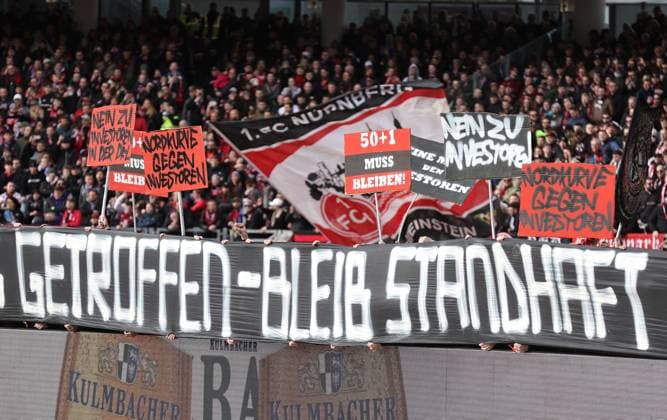 18 02 2024 Soccer Season 2023 2024 2 Soccer Bundesliga 22 Matchday 1 FC Nürnberg FCN Club 1 FC Kaiserslautern FCK Roten Teufel Sportfoto Zink DaMa xdaxmax DFL regulations prohibit any use of photographs as image sequences and or quasi video only for editorial use Clubfan Clubfans FCN Fans Fans protest inside the stadium during the match with banners banners signs and flags against the DFL and the planned investor entry