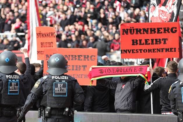 18 02 2024 Soccer Season 2023 2024 2 Soccer Bundesliga 22 Matchday 1 FC Nürnberg FCN Club 1 FC Kaiserslautern FCK Roten Teufel Sportfoto Zink DaMa xdaxmax DFL regulations prohibit any use of photographs as image sequences and or quasi video only for editorial use Clubfan Clubfans FCN Fans Fans protest in the interior during the game with banners banners signs and flags against the DFL and the planned investor entry observed by the police