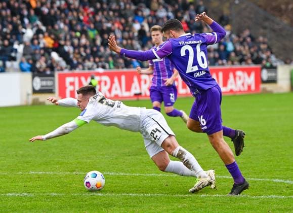 Germany, Spiesen Elversberg, 18 02 2024, Ursapharm Arena at Kaiserlinde, SV Elversberg vs VfL Osnabrueck 2 Bundesliga, Luca Schnellbacher SV Elversberg goes down after a push from Dave Gnaase VfL Osnabrueck Spiesen Elversberg Ursapharm Arena at Kaiserlinde Saarland Germany eu-images-738