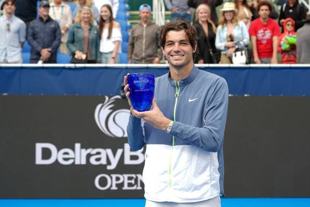DELRAY BEACH, FL - FEBRUARY 19: Taylor Fritz (USA) poses with the Champions Trophy after winning the 2024 Delray Beach Open on February 19, 2024, at the Delray Beach Tennis Center in Delray Beach, FL.(Photo by Andrew Patron Icon Sportswire) TENNIS: FEB 19 Delray Beach Open EDITORIAL USE ONLY Icon2402198136