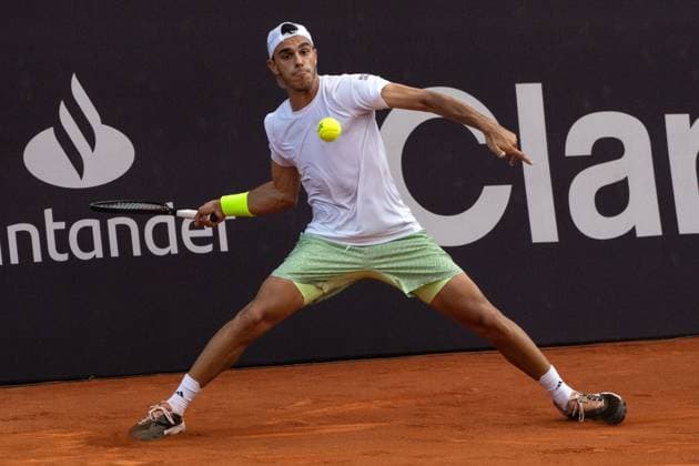 (240220) -- RIO DE JANEIRO, Feb. 20, 2024 -- Francisco Cerundolo of Argentina hits a return during the round 32 match against Francisco Comesana of Argentina at the 2024 ATP500 Rio Open at Jockey Club Brasileiro in Rio de Janeiro, Brazil, Feb. 19, 2024. ) (SP)BRAZIL-RIO DE JANEIRO-TENNIS-ATP500-RIO OPEN WangxTiancong 