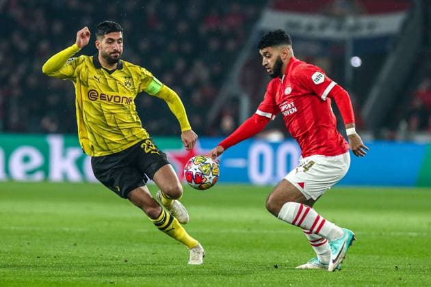 Emre Can Borussia Dortmund BVB, 23 in duel against Ismael Saibari PSV Eindhoven, 34 , NLD, PSV Eindhoven vs Borussia Dortmund BVB, UEFA Champions League 2023 24 Round of 16, first leg, 20 02 2024, NLD, PSV Eindhoven vs Borussia Dortmund BVB, UEFA Champions League 2023 24 Round of 16, first leg, 20 02 2024, Photo Eibner Pressefoto Gabriel Boia EIndhoven Copyright: xEibner-Pressefoto GabrielxBoiax EP_EER