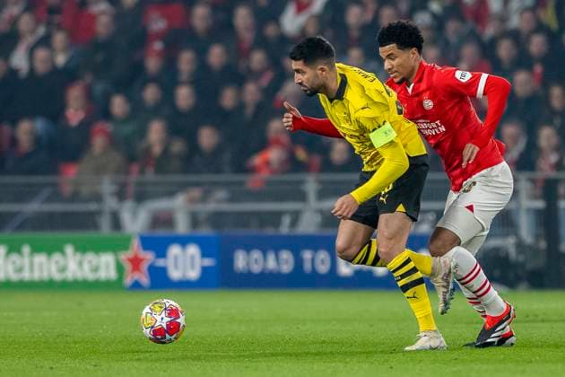 Duel between Emre Can Borussia Dortmund 09, 23 and Malik Tillman PSV Eindhoven, 10 Football UEFA Champions League, Season 2023 2024, Round of 16, Round 1 of 2, PSV Eindhoven Borussia Dortmund on 20 02 2024 at Phillips Stadium in Eindhoven Photo Kirchner Media TH Copyright: xKirchner-Media THx