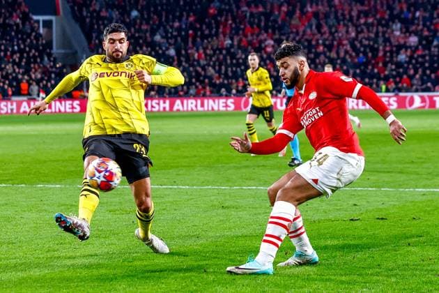 EINDHOVEN, 20-02-2024, Philips Stadium, UEFA Champions League season 2023 24, match between PSV and Borussia Dortmund, Borussia Dortmund player Emre Can and PSV player Ismael Saibari PSV - Borussia Dortmund  x24344500x Copyright:
