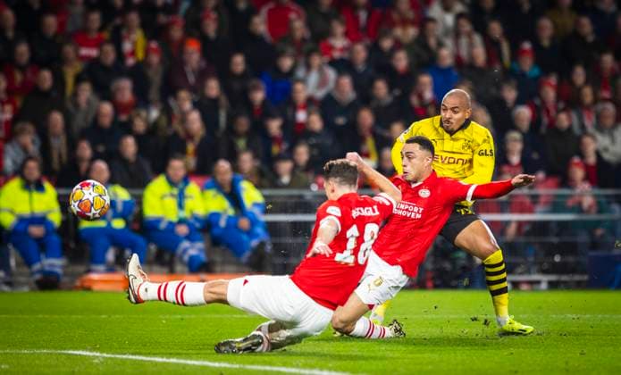 Eindhoven, Netherlands 20th Feb 2024 Goal for 0 1 by Donyell Malen BVB Against Sergino Dest Eindhoven and Olivier Boscagli Eindhoven PSV Eindhoven Borussia Dortmund 20 02 2024