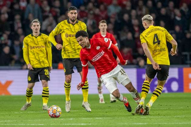 Foul by Nico Schlotterbeck Borussia Dortmund 09, 04 on Malik Tillman PSV Eindhoven, 10 Behind Marcel Sabitzer Borussia Dortmund, 20 and Emre Can Borussia Dortmund 09, 23 Football UEFA Champions League, Season 2023 2024, Round of 16, Round 1 of 2, PSV Eindhoven Borussia Dortmund on 20 02 2024 at Phillips Stadium in Eindhoven Photo Kirchner Media TH Copyright: xKirchner-Media THx