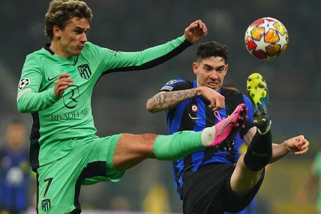 Foto Spada LaPresse 20 febbraio 2024 - Milano , Italia - calcio - Fc Inter Vs Atletico Madrid - Champions League 2023 2024 - Stadio San Siro Nella foto: griezmann , Alessandro Bastoni (FC Inter); February 20 , 2024 Milan , Italy - sport, calcio - Fc Inter Vs Atletico Madrid - Champions League 2023 2024 - San Siro Stadium . In the pic : griezmann, Alessandro Bastoni (FC Inter);  Copyright: xSpada LaPressex