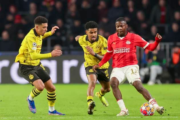 Jadon Sancho Borussia Dortmund , Ian Maatsen Borussia Dortmund and Johan Bakayoko PSV Eindhoven fight for the ball, UEFA Champions League 2023 2024 Round of 16 1st leg, PSV Eindhoven vs Borussia Dortmund, PSV Stadion, 20 02 2024, Eindhoven, Netherlands