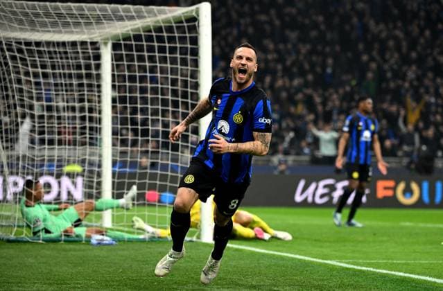 (240221) -- MILAN, Feb. 21, 2024 -- Inter Milan s Marko Arnautovic (front) celebrates his goal during the UEFA Champions League Round of 16 1st leg match between Inter Milan and Atletico Madrid in Milan, Italy, Feb.20, 2024. (Photo by Xinhua) (SP)ITALY-MILAN-FOOTBALL-UEFA CHAMPIONS LEAGUE-INTER MILAN VS ATLETICO MADRID AlbertoxLingria 