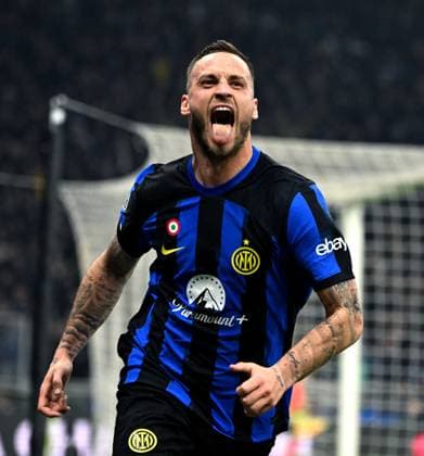 (240221) -- MILAN, Feb. 21, 2024 -- Inter Milan s Marko Arnautovic celebrates his goal during the UEFA Champions League Round of 16 1st leg match between Inter Milan and Atletico Madrid in Milan, Italy, Feb.20, 2024. (Photo by Xinhua) (SP)ITALY-MILAN-FOOTBALL-UEFA CHAMPIONS LEAGUE-INTER MILAN VS ATLETICO MADRID AlbertoxLingria 