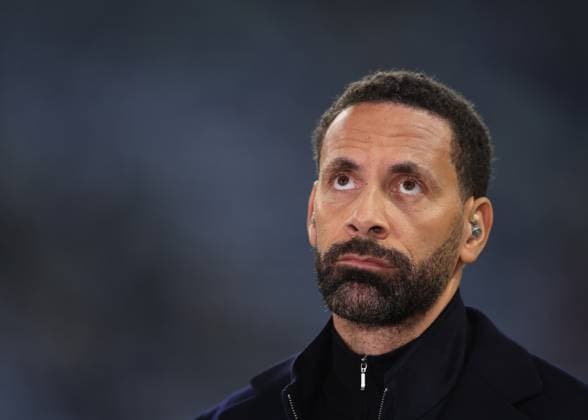 Porto, Portugal, 21st February 2024. Former player and now TV Pundit Rio Ferdinand during the UEFA Champions League match at the Estadio do Dragao, Porto. Picture credit should read: David Klein Sportimage EDITORIAL USE ONLY. No use with unauthorised audio, video, data, fixture lists, club league logos or live services. Online in-match use limited to 120 images, no video emulation. No use in betting, games or single club league player publications. SPI-2957-0004