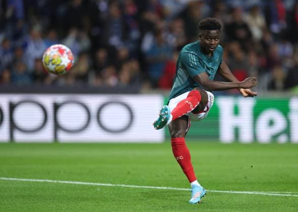 Porto, Portugal, 21st February 2024. Bukayo Saka of Arsenal warms up before the UEFA Champions League match at the Estadio do Dragao, Porto. Picture credit should read: David Klein Sportimage EDITORIAL USE ONLY. No use with unauthorised audio, video, data, fixture lists, club league logos or live services. Online in-match use limited to 120 images, no video emulation. No use in betting, games or single club league player publications. SPI-2957-0013