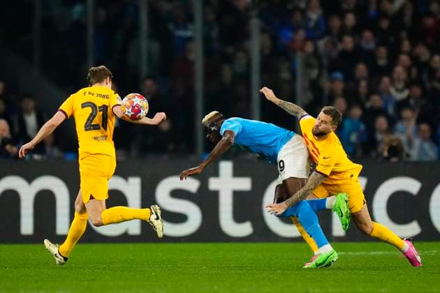 SSC Napoli v FC Barcelona, Barca Round of 16 First Leg - UEFA Champions League 2023 24 Inigo Martinez centre-back of Barcelona and Spain and Victor Osimhen centre-forward of Napoli and Nigeria compete for the ball during the UEFA Champions League 2023 24 round of 16 first leg match between SSC Napoli and FC Barcelona at Stadio Diego Armando Maradona on February 21, 2024 in Naples, Italy. Naples Italy  Copyright: xJosexBretonx originalFilename:breton-sscnapol240221_np3NZ.jpg