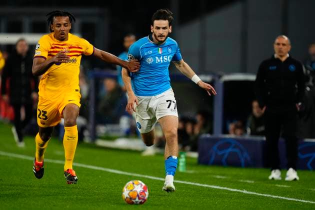 SSC Napoli v FC Barcelona, Barca Round of 16 First Leg - UEFA Champions League 2023 24 Khvicha Kvaratskhelia left winger of Napoli and Georgia and Jules Kounde centre-back of Barcelona and France compete for the ball during the UEFA Champions League 2023 24 round of 16 first leg match between SSC Napoli and FC Barcelona at Stadio Diego Armando Maradona on February 21, 2024 in Naples, Italy. Naples Italy  Copyright: xJosexBretonx originalFilename:breton-sscnapol240221_np1Ip.jpg