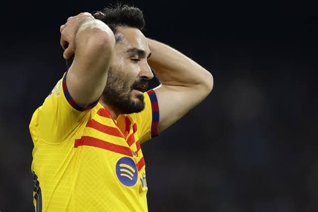 Champions League match SSC Napoli vs Barcellona Barcellona s German midfielder Ilkay Gundogan looks dejected during the UEFA Champions League round 16 match between SSC Napoli vs Barcellona at the Diego Armando Maradona Stadium in Naples, southern Italy, on February 21, 2024. ABPH2435 Copyright: xAntonioxBalascox