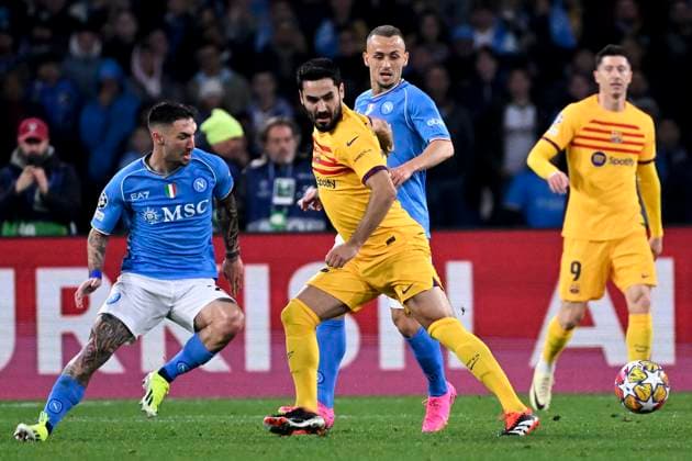 Matteo Politano of SSC Napoli, Ilkay Gundogan of FC Barcelona, Barca and Stanislav Lobotka of SSC Napoli during the Champions League football match between SSC Napoli and FC Barcelona at Diego Armando Maradona stadium in Naples (Italy), February 21st, 2024. AndreaxStaccioli
