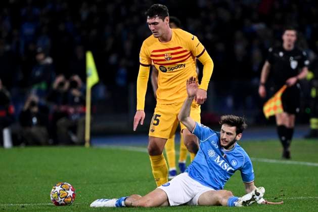 Inigo Martinez of FC Barcelona, Barca and Khvicha Kvaratskhelia of SSC Napoli during the Champions League football match between SSC Napoli and FC Barcelona at Diego Armando Maradona stadium in Naples (Italy), February 21st, 2024. AndreaxStaccioli