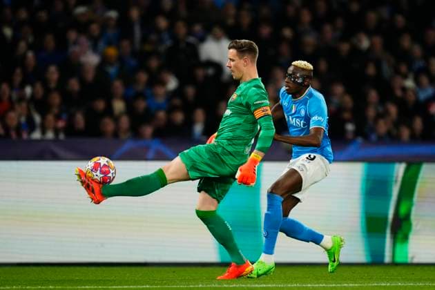 SSC Napoli v FC Barcelona, Barca Round of 16 First Leg - UEFA Champions League 2023 24 Marc-Andre ter Stegen goalkeeper of Barcelona and Germany and Victor Osimhen centre-forward of Napoli and Nigeria compete for the ball during the UEFA Champions League 2023 24 round of 16 first leg match between SSC Napoli and FC Barcelona at Stadio Diego Armando Maradona on February 21, 2024 in Naples, Italy. Naples Italy  Copyright: xJosexBretonx originalFilename:breton-sscnapol240221_npVFm.jpg