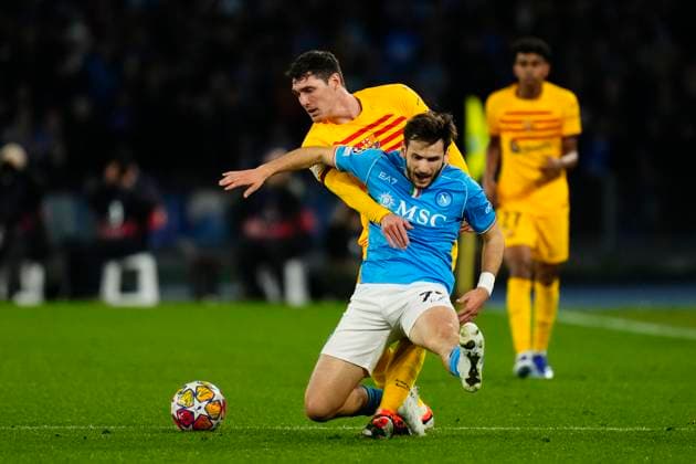 SSC Napoli v FC Barcelona, Barca Round of 16 First Leg - UEFA Champions League 2023 24 Khvicha Kvaratskhelia left winger of Napoli and Georgia and Andreas Christensen centre-back of Barcelona and Denmark compete for the ball during the UEFA Champions League 2023 24 round of 16 first leg match between SSC Napoli and FC Barcelona at Stadio Diego Armando Maradona on February 21, 2024 in Naples, Italy. Naples Italy  Copyright: xJosexBretonx originalFilename:breton-sscnapol240221_npTdh.jpg