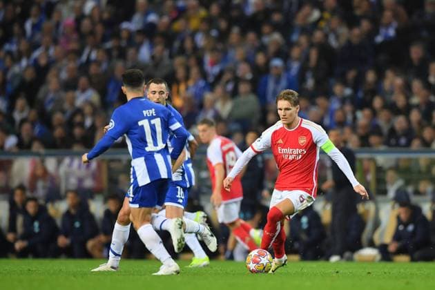 21st February 2024: Dragon Stadium, Porto, Portugal; Champions League football. FC Porto versus Arsenal FC: Nicol& xe1;s Gonz& xe1;lez of Porto challenges Martin Odegaard of Arsenal  ActionPlus12610901 DanielxCastro