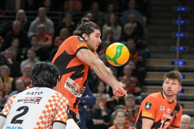 Berlin, Germany 21 January 2024 CL Volleyball 1 4 Final 2023 2024 Berlin Recycling Volleys vs Itas Trentino In the picture Timothee Carle BR Volleys receiving the ball , in the foreground Satoshi Tsuiki BR Volleys , in the background Ruben Schott BR Volleys Copyright: xFotostandx xReuhlx