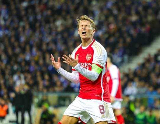 FC Porto v Arsenal Champions League 21 02 2024. Martin Odegaard (8) of Arsenal shows frustration during the Champions League match between FC Porto and Arsenal at Estadio do Dragao, Porto, Portugal on 21 February 2024. Editorial use only , Copyright: xNigelxKeenex PSI-19079-0034