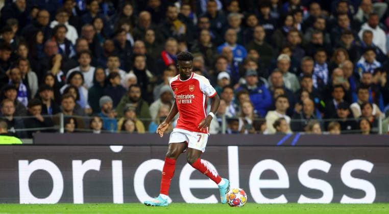 Bukayo Saka of Arsenal Porto v Arsenal, UEFA Champions League, Round of 16, First Leg, Football, Estadio do Dragao, Porto, Portugal - 21 Feb 2024 EDITORIAL USE ONLY No use with unauthorised audio, video, data, fixture lists, club league logos or live services. Online in-match use limited to 120 images, no video emulation. No use in betting, games or single club league player publications. Copyright: xKieranxMcManus Shutterstockx 14355127ar