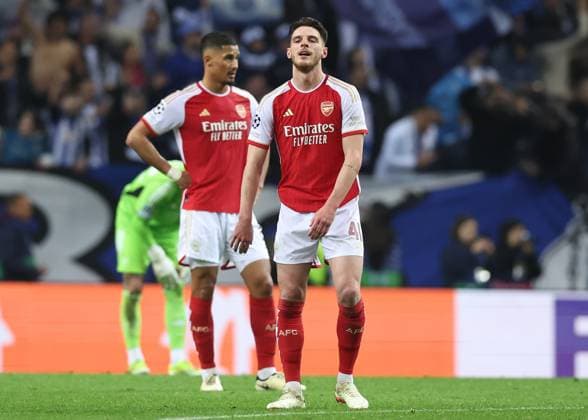 Porto, Portugal, 21st February 2024. Declan Rice of Arsenal looks crest fallen during the UEFA Champions League match at the Estadio do Dragao, Porto. Picture credit should read: David Klein Sportimage EDITORIAL USE ONLY. No use with unauthorised audio, video, data, fixture lists, club league logos or live services. Online in-match use limited to 120 images, no video emulation. No use in betting, games or single club league player publications. SPI-2957-0063