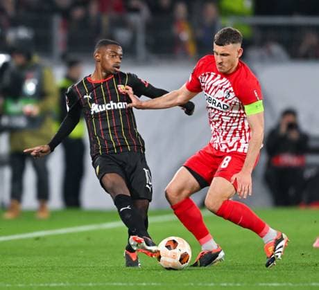 Germany, Freiburg, 22 02 2024, Europa Park Stadion, SC Freiburg vs RC Lens UEFA Europa League, David Costa RC Lens and Maximilian Eggestein SC Freiburg battle for the ball Freiburg Europa Park Stadion Baden Wuerttemberg Germany eu-images-738
