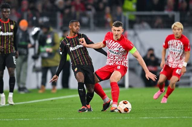 Germany, Freiburg, 22 02 2024, Europa Park Stadion, SC Freiburg vs RC Lens UEFA Europa League, David Costa RC Lens and Maximilian Eggestein SC Freiburg battle for the ball Freiburg Europa Park Stadion Baden Wuerttemberg Germany eu-images-738