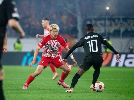 Ritsu Doan SC Freiburg, 42 in duel with David Pereira da Costa RC Lens, 10 , GER, SC Freiburg vs RC Lens, Football UEFA Europa League, Playoff Intermediate Round second leg, 2023 2024 season, 22 02 2024 GER, SC Freiburg vs RC Lens, Football UEFA Europa League, Playoff Intermediate Round second leg, 2023 2024 season, 22 02 2024 Freiburg Copyright: xEibner-Pressefoto Memmlerx EP_MMR