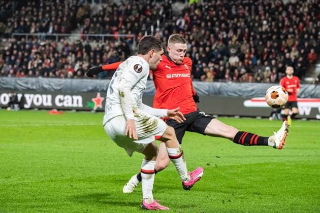 Christian Pulisic (AC Milan) Adrien Truffert (Stade Rennais) FOOTBALL : Stade Rennais x AC Milan - Ligue Europa - Barrage retour - 22 02 2024 BaptisteAutissier Panoramic 