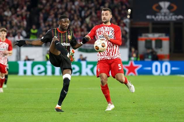 Salis Abdul Samed RC Lens, 06 and Manuel Gulde SC Freiburg, 05 in duel , Soccer, UEFA Europa League, Play off 2 match, 2023 2024, SC Freiburg vs RC Lens, 22 02 2024, Europa Park Stadion , Freiburg im Breisgau, Germany Freiburg im Breisgau Europa Park Stadion Baden Wuerttemberg Germany Copyright: xGrantxHubbsx